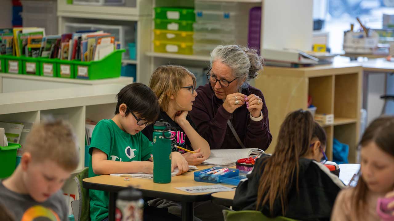 teacher-working-with-student